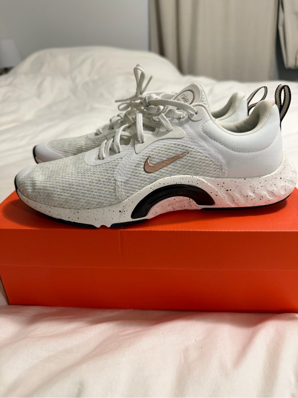Nike Women's White Sneakers with Rose Gold Swoosh